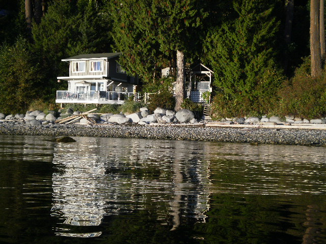 cottage and hot tub deck from a little kayak